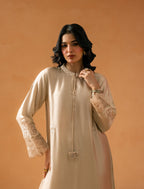 Ivory Kaftaan - tasseled neckline and scalloped cutwork cuffs